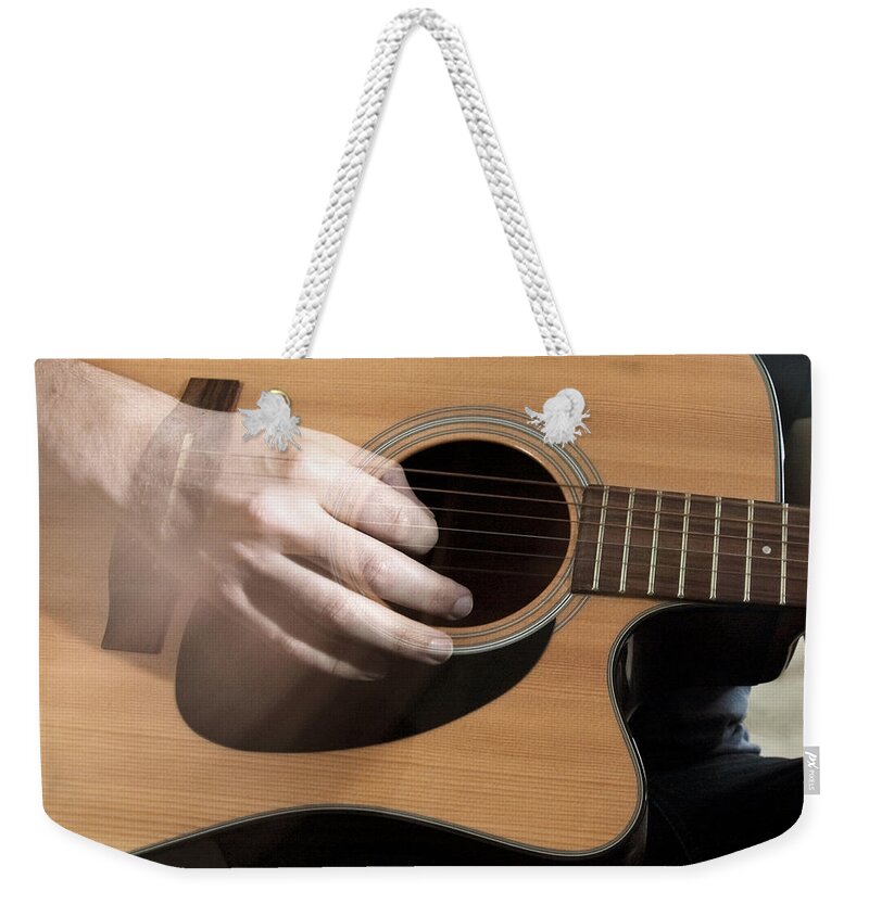 Suffolk Weekender Tote Bag featuring the photograph Man Playing Guitar by Paul Strowger