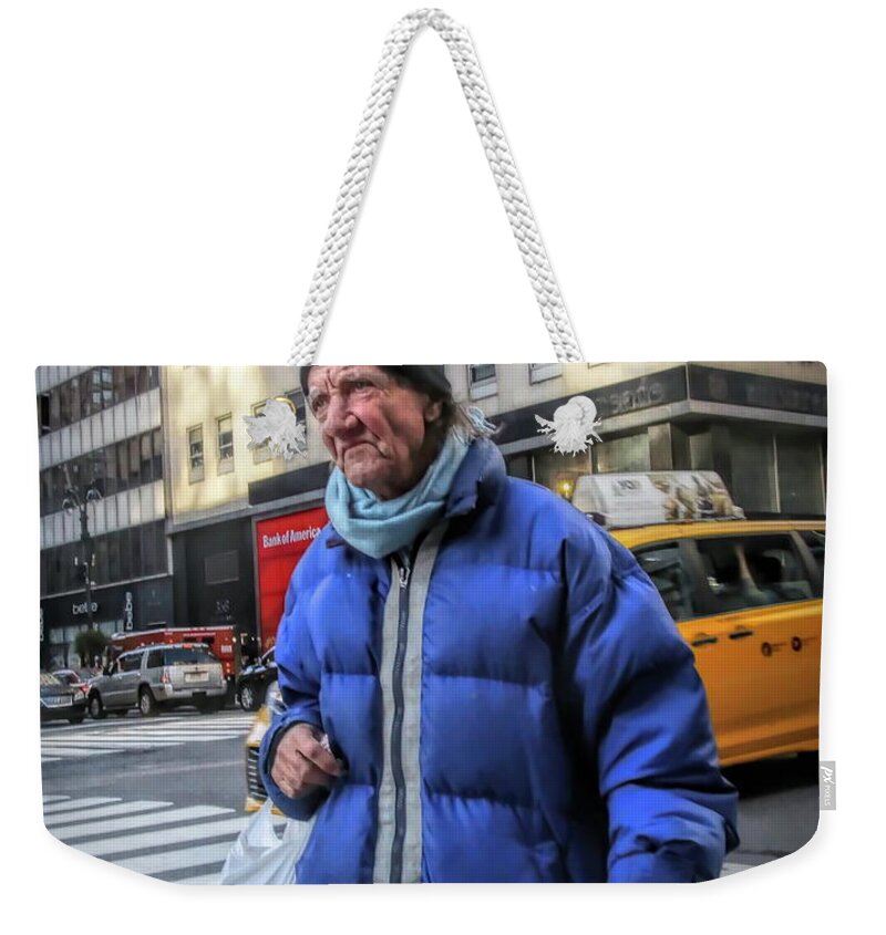  Weekender Tote Bag featuring the photograph Man vs. City by Jack Wilson