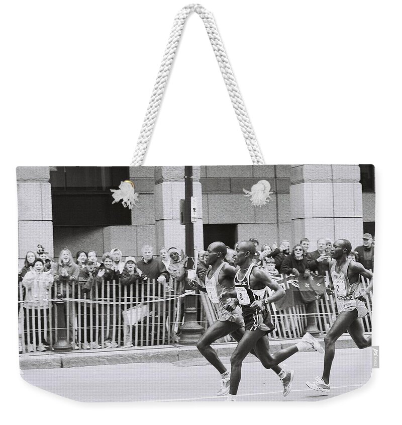 Marathon Weekender Tote Bag featuring the photograph Marathon by FD Graham