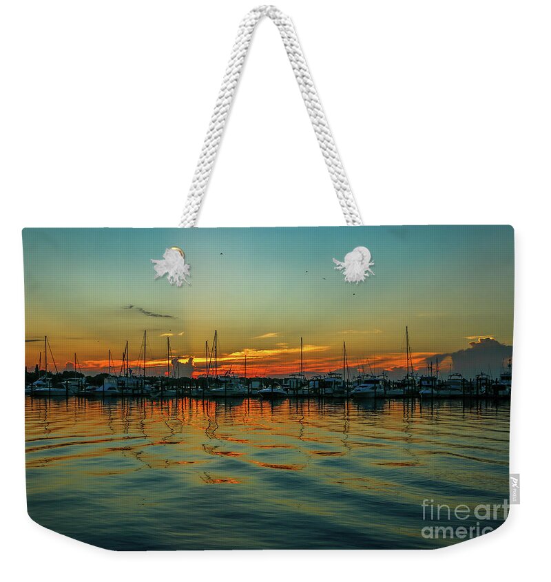 Marina Weekender Tote Bag featuring the photograph Marina Reflection Sunrise by Tom Claud