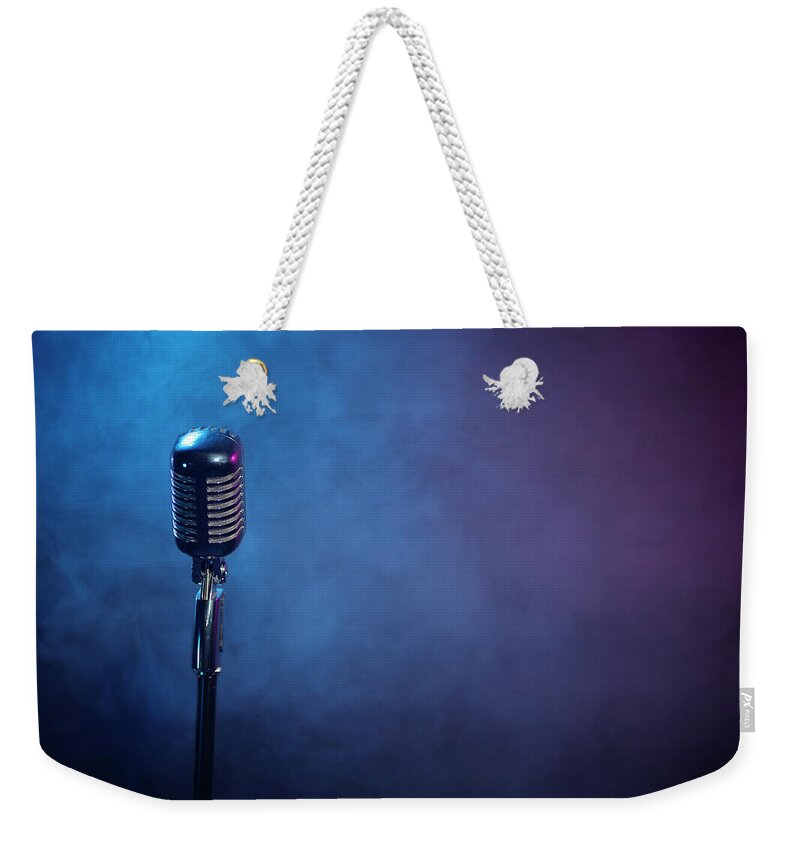Microphone Stand Weekender Tote Bag featuring the photograph Microphone by Larnce Gold