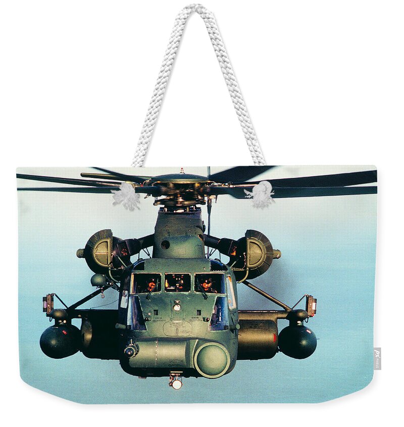 Caucasian Ethnicity Weekender Tote Bag featuring the photograph Military Helicopter In Flight by Frank Rossoto Stocktrek