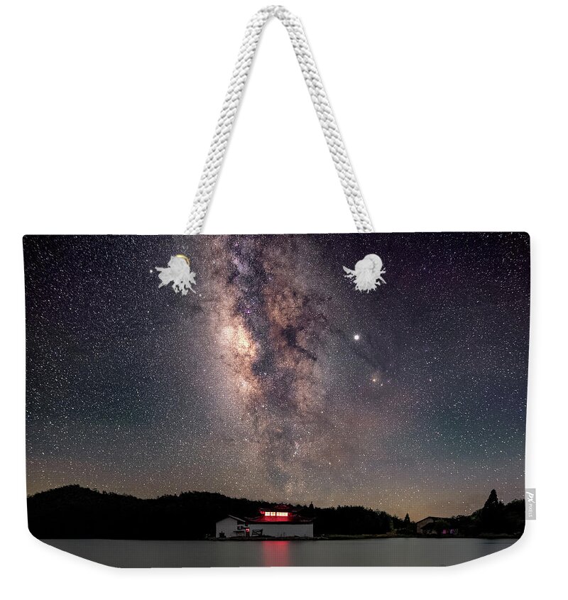 Milky Way Weekender Tote Bag featuring the photograph Milky Way over the TianPing Mountain Lake Temple by William Dickman