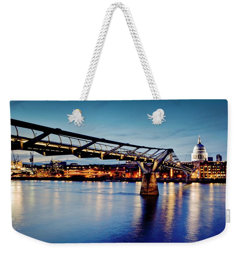 London Millennium Footbridge Weekender Tote Bag featuring the photograph Millennium Bridge Lit Up At Night by Cultura Exclusive/dan Dunkley