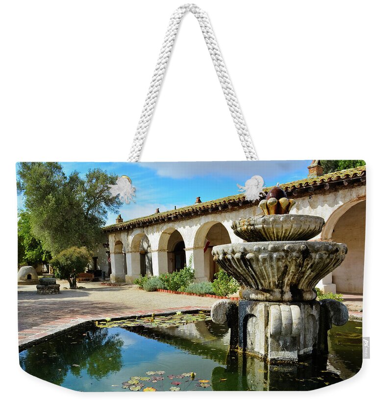 Mission San Miguel Weekender Tote Bag featuring the photograph Mission San Miguel Fountain by Kyle Hanson
