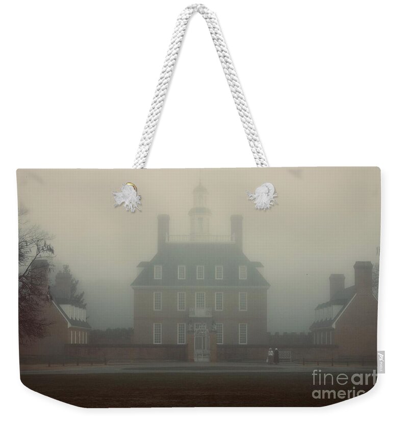 Colonial Williamsburg Weekender Tote Bag featuring the photograph Misty Morning at the Palace by Lara Morrison