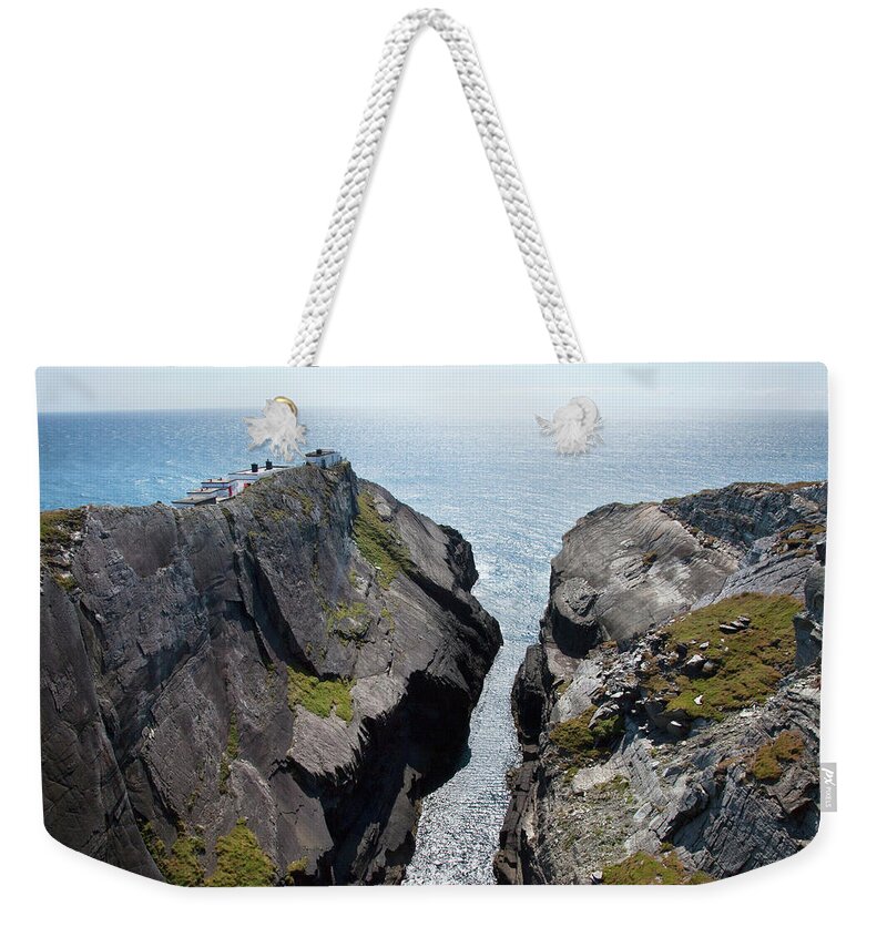 Scenics Weekender Tote Bag featuring the photograph Mizen Head Lighthouse by Peter Zoeller / Design Pics
