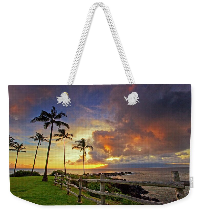 Maui Kapalua Seascape Ocean Palmtrees Sunset Weekender Tote Bag featuring the photograph Molokai Sunset by James Roemmling