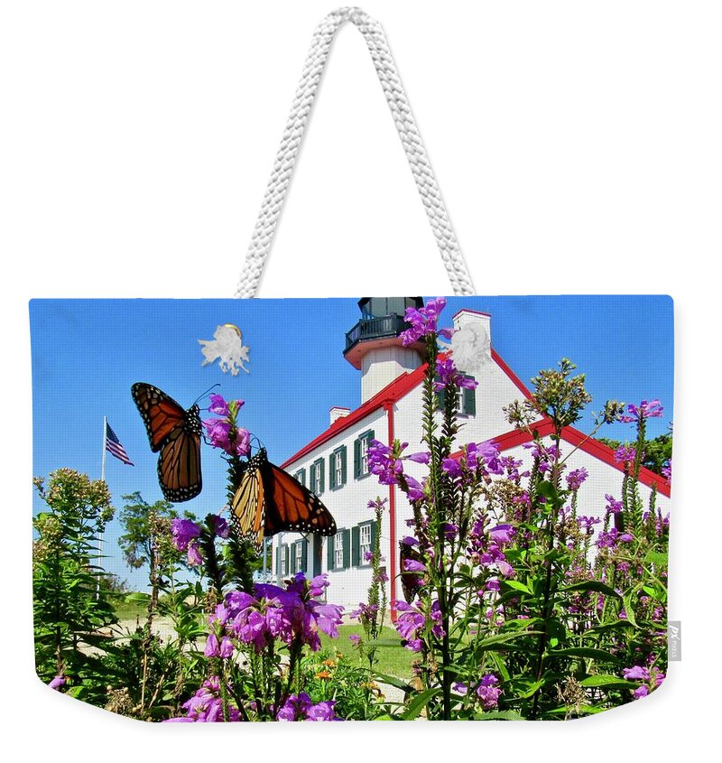 East Point Lighthouse Weekender Tote Bag featuring the photograph Monarchs in September by Nancy Patterson