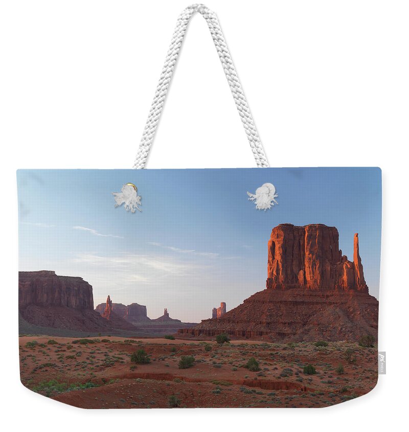 Mexican Hat Weekender Tote Bag featuring the photograph Monument Valley At Sunset by Antonyspencer