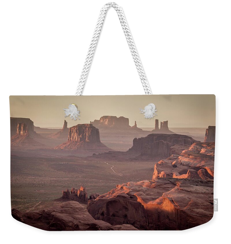 Scenics Weekender Tote Bag featuring the photograph Monument Valley From The Hunts Mesa by Francesco Riccardo Iacomino