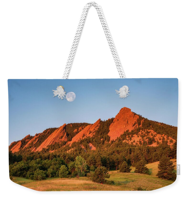 Boulder Weekender Tote Bag featuring the photograph Moonset over the Flatirons by Darren White