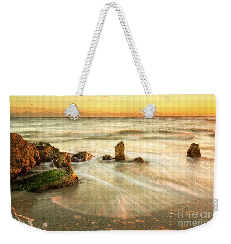 Photographs Weekender Tote Bag featuring the photograph Movement Of The Sea At Sunset, Long Exposure by Felix Lai