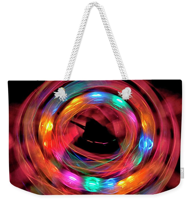 Abstract Weekender Tote Bag featuring the photograph Moving colors by Patricia Hofmeester