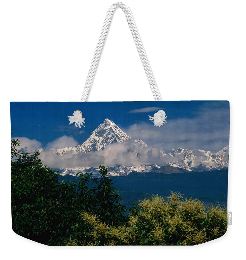 Scenics Weekender Tote Bag featuring the photograph Mt. Machupuchare In The Annapurnas by Lonely Planet
