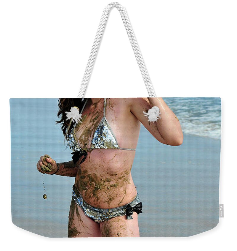 Girl Weekender Tote Bag featuring the photograph Mud Fight by Robert WK Clark