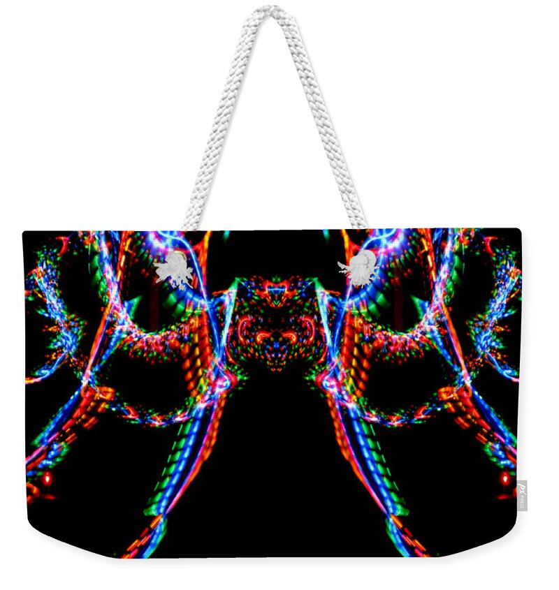 Black Background Weekender Tote Bag featuring the photograph Multi-colored Abstract Light Pattern by Michael Duva