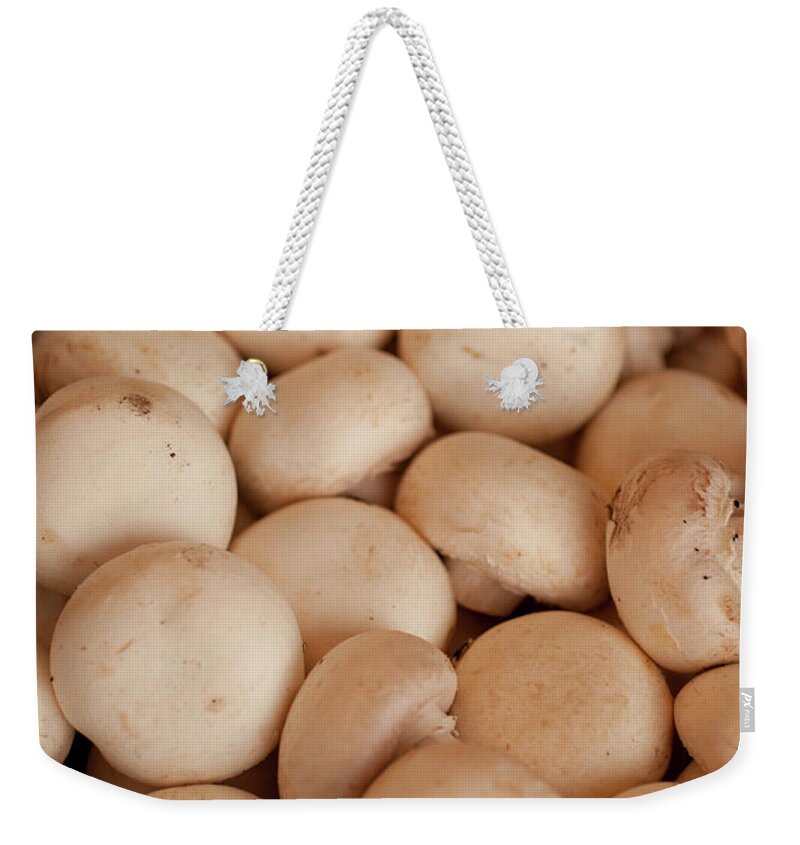 Heap Weekender Tote Bag featuring the photograph Mushrooms by Caroyl La Barge