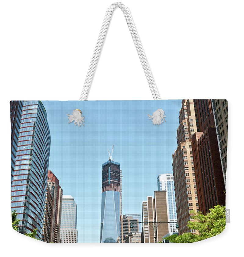 Lower Manhattan Weekender Tote Bag featuring the photograph New Skyline Of Lower Manhattan With by Travelif