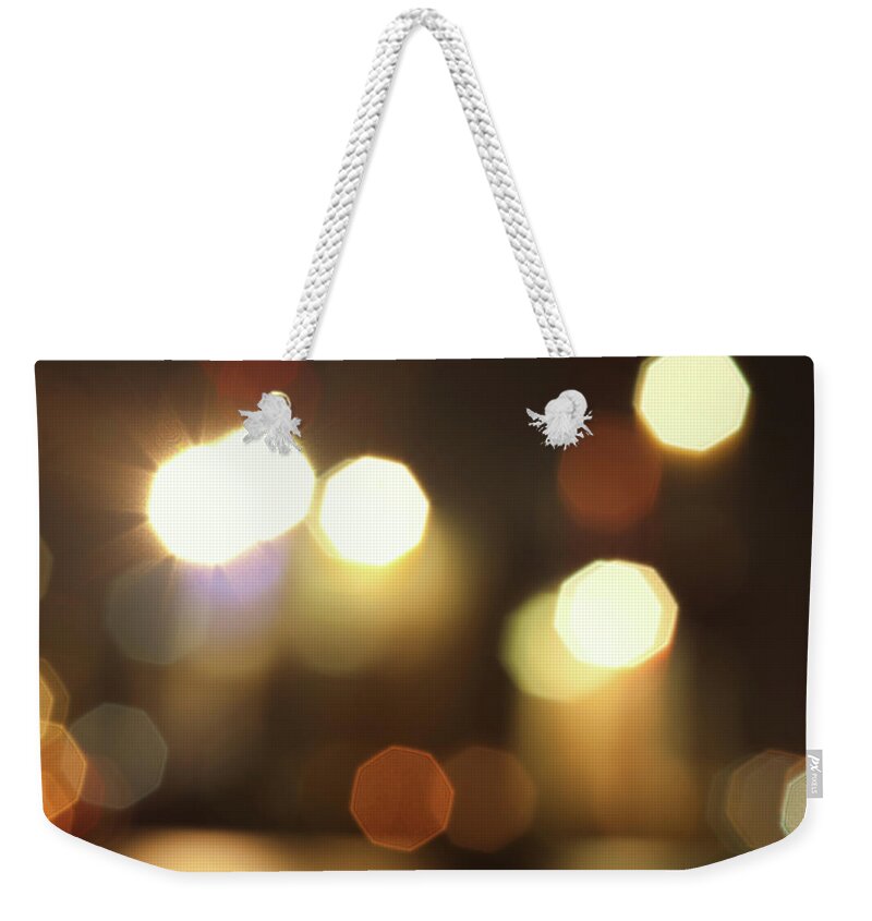 Shadow Weekender Tote Bag featuring the photograph Night Lights Bokeh by Cinoby