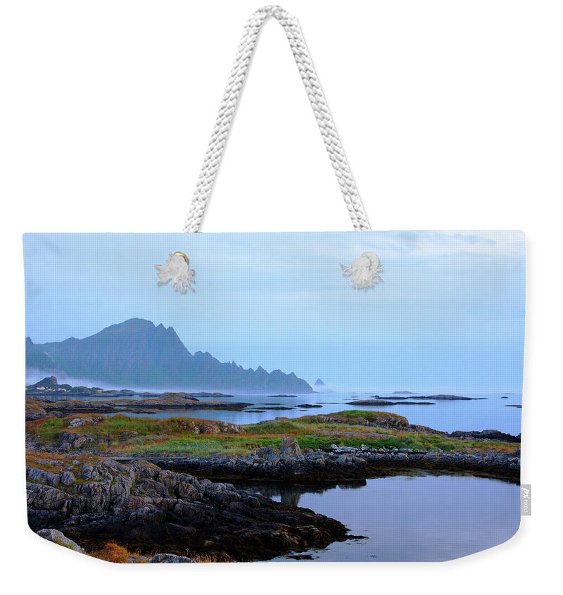 Water's Edge Weekender Tote Bag featuring the photograph Norvegian Landscape At Dusk by Anzeletti