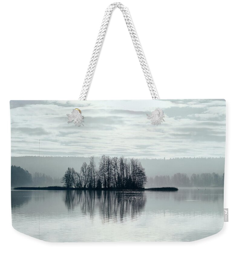 Finland Weekender Tote Bag featuring the photograph November Light. Silver clouds Silver light by Jouko Lehto