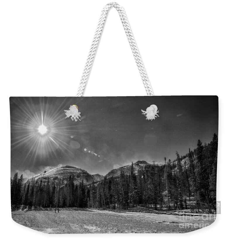 Black-and-white Weekender Tote Bag featuring the photograph Nymph Lake Frozen by Bill Frische