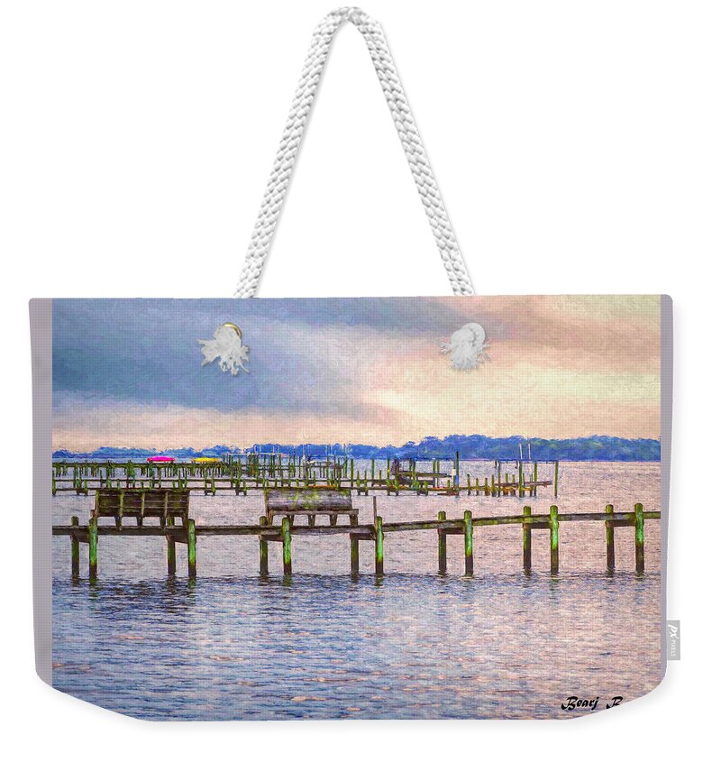 Outerbanks Weekender Tote Bag featuring the photograph O B X Piers by Bearj B Photo Art