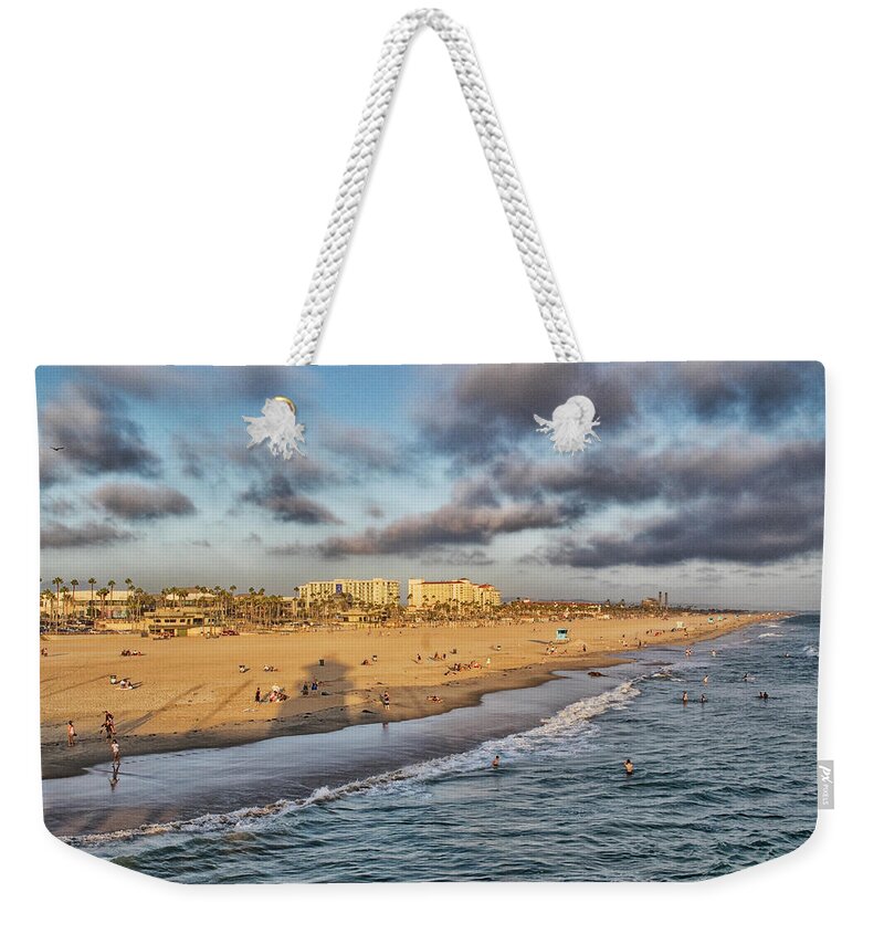 Sunshine Weekender Tote Bag featuring the photograph Ocean Play by Tom Kelly