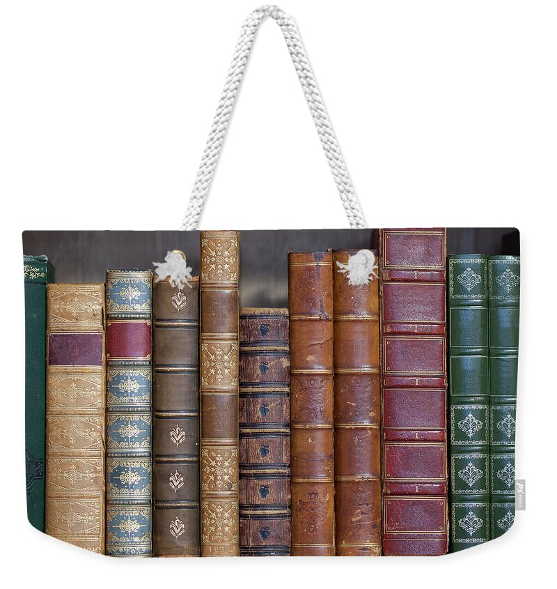 Working Weekender Tote Bag featuring the photograph Old Leather Bound Books by Andrew howe