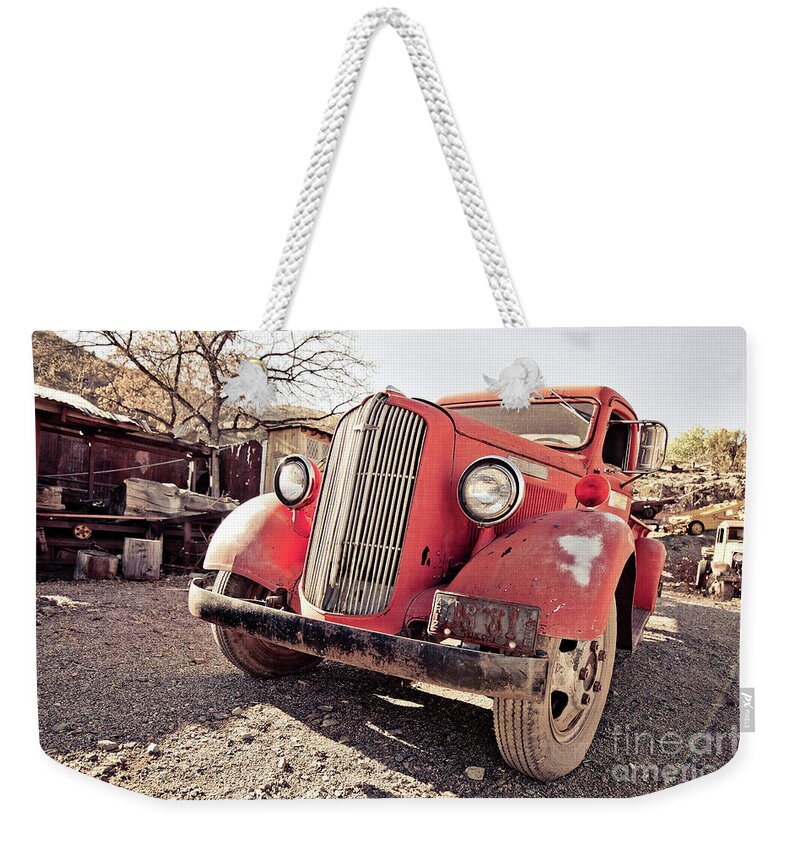 Truck Weekender Tote Bag featuring the photograph Old Red Truck Jerome Arizona by Edward Fielding
