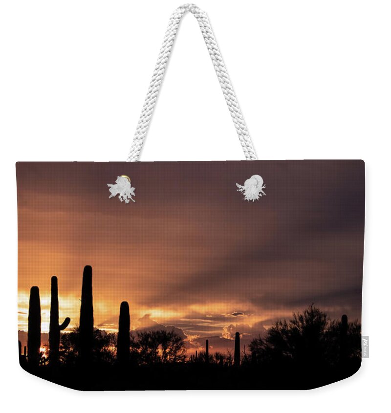 Sun Weekender Tote Bag featuring the photograph Old West Sunset by Elaine Malott