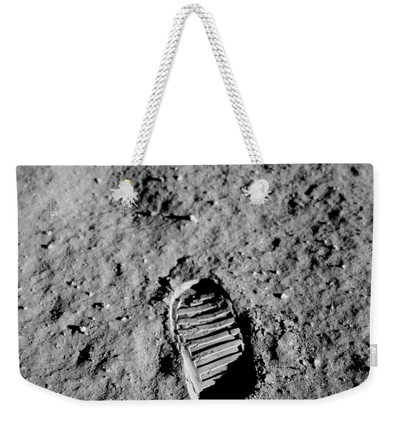 Sea Weekender Tote Bag featuring the digital art One Small Step by Michael Graham