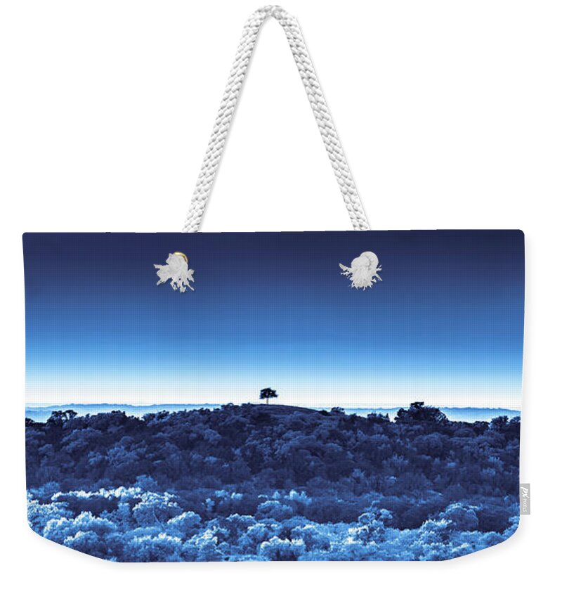 Weekender Tote Bag featuring the digital art One Tree Hill -Blue -2 by Darryl Dalton