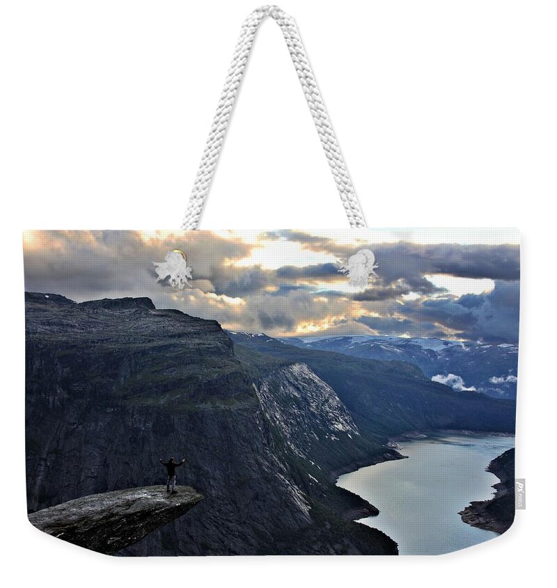 Scenics Weekender Tote Bag featuring the photograph Opening The Waters In Trolltunga by Tonibrugues