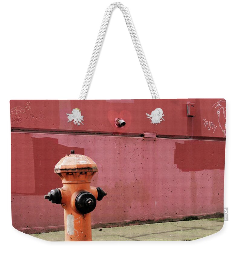 Spray Weekender Tote Bag featuring the photograph Orange Fire Hydrant With Pink And Red by Kevinruss