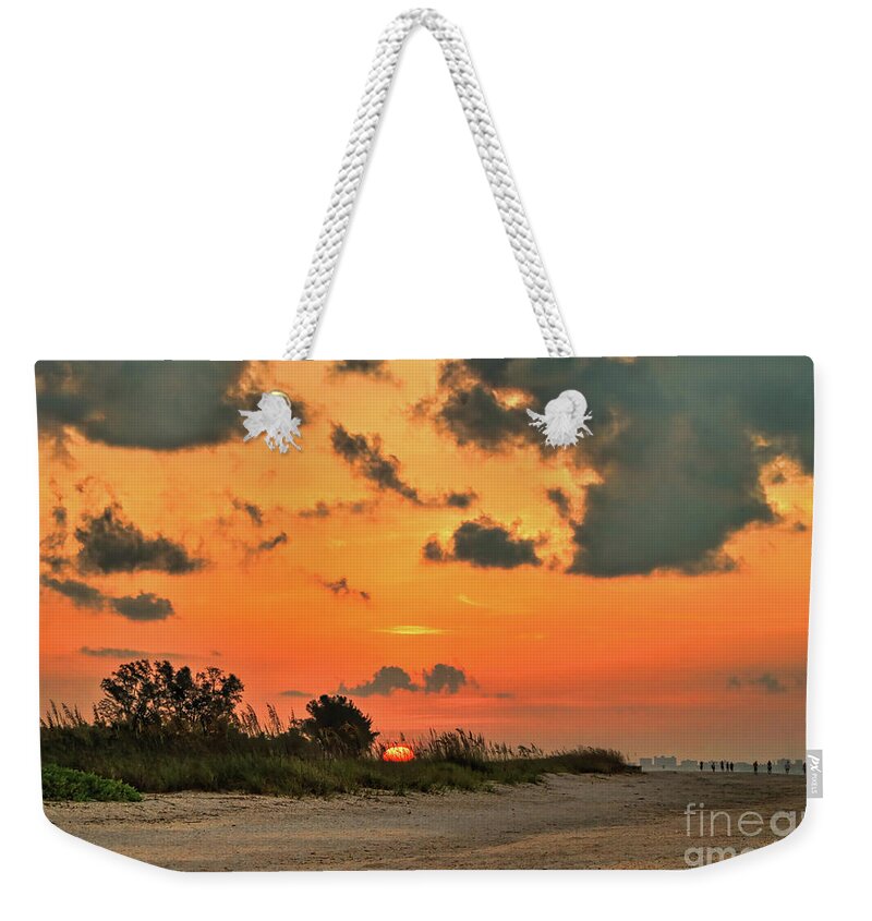 Sunrise Weekender Tote Bag featuring the photograph Orange Sunrise Over Sanibel Island by Jeff Breiman