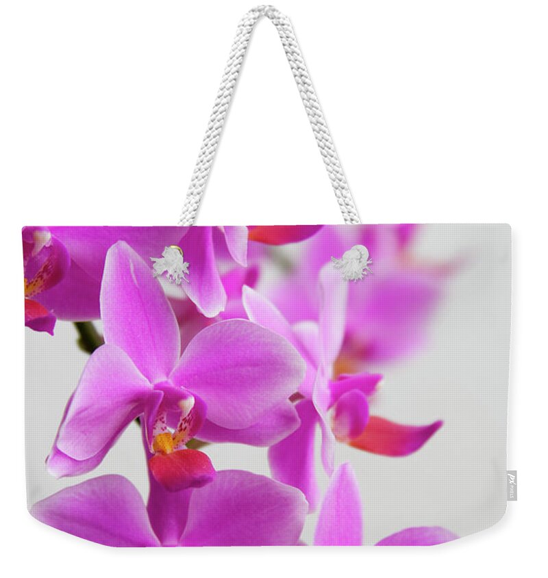 Cut Out Weekender Tote Bag featuring the photograph Orchids by Ejla