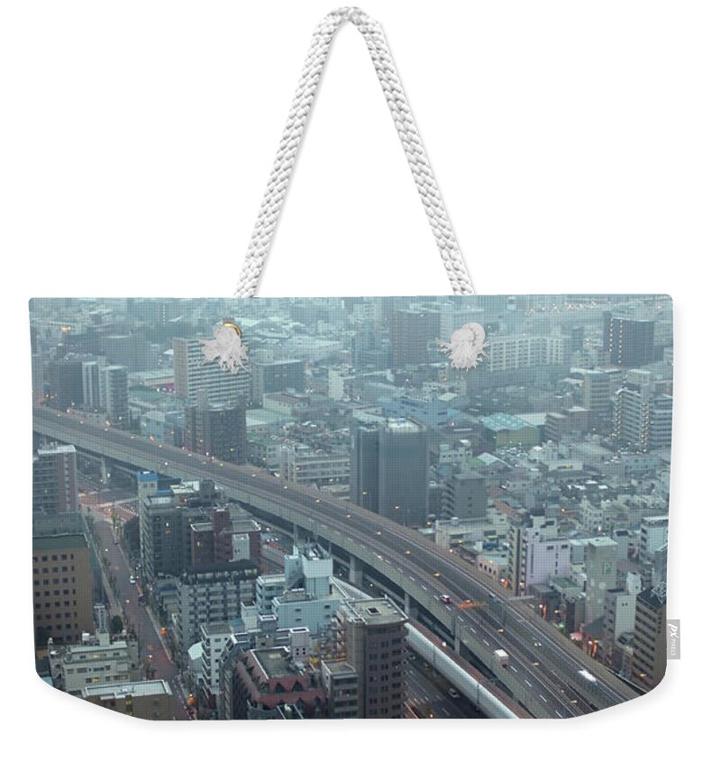 Dawn Weekender Tote Bag featuring the photograph Osaka by Photo By Nicholas Roberts