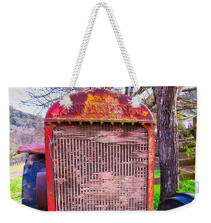 Tractor Weekender Tote Bag featuring the photograph Out To Pasture by Tom Gresham
