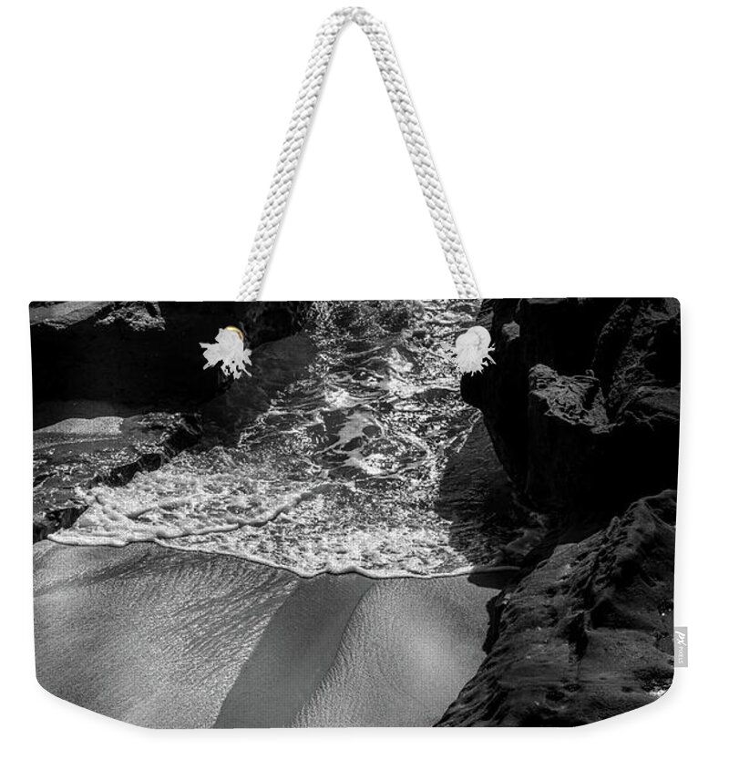Beach Weekender Tote Bag featuring the photograph Out With The Tide by Aaron Burrows
