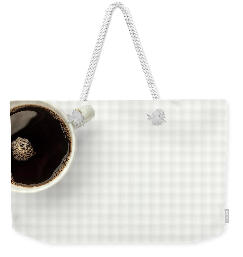 White Background Weekender Tote Bag featuring the photograph Overhead View Of Black Coffee by Anthony Bradshaw