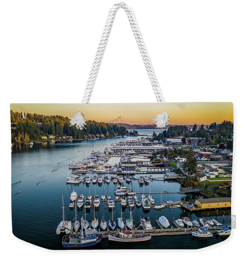 Harbor Weekender Tote Bag featuring the photograph Paddlers Sunset by Clinton Ward