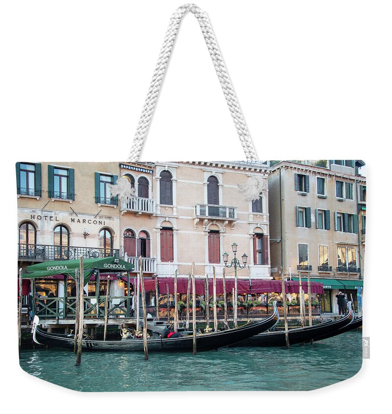 Tourism Weekender Tote Bag featuring the photograph Parking by Laura Hedien