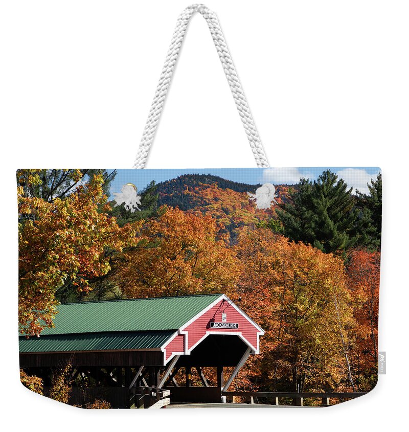Jackson Nh Weekender Tote Bag featuring the photograph Peak fall colors over the Jackson Covered Bridge by Jeff Folger