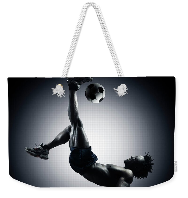 People Weekender Tote Bag featuring the photograph Performance And Precision by Colin Anderson