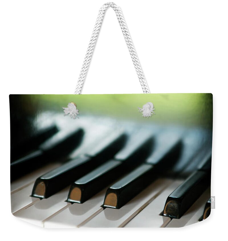 Artist Weekender Tote Bag featuring the photograph Piano Keys by Bluberries