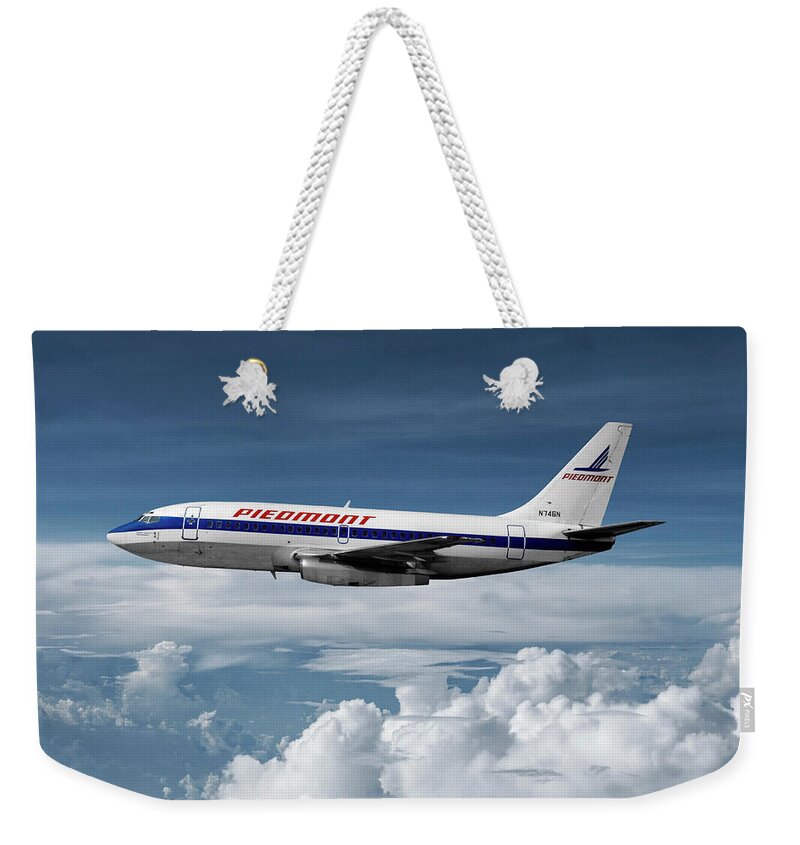 Piedmont Airlines Weekender Tote Bag featuring the mixed media Piedmont Airlines Boeing 737 by Erik Simonsen
