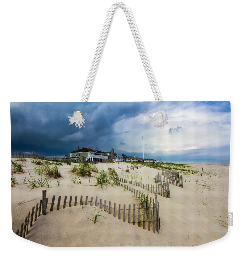 Pikes Beach Fence Dune Road Clouds Powder White Sand Green Grass Blue Sky House Storm Ocean Front Home Hampton Hamptons Westhampton Long Island New York Weekender Tote Bag featuring the photograph Pikes Beach Fence Line by Robert Seifert