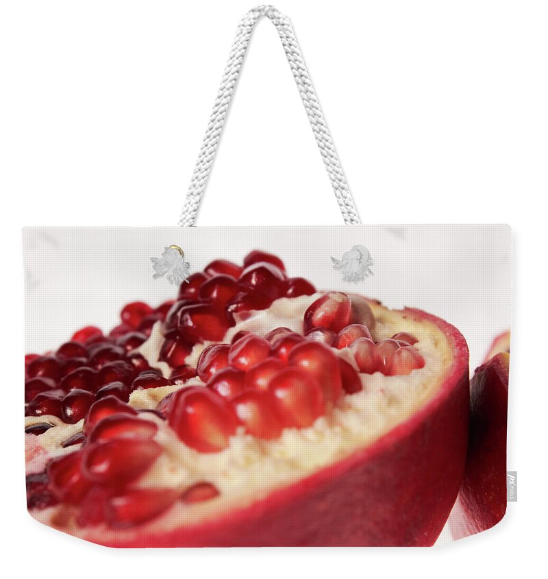 White Background Weekender Tote Bag featuring the photograph Pomegranate by Takao Shioguchi